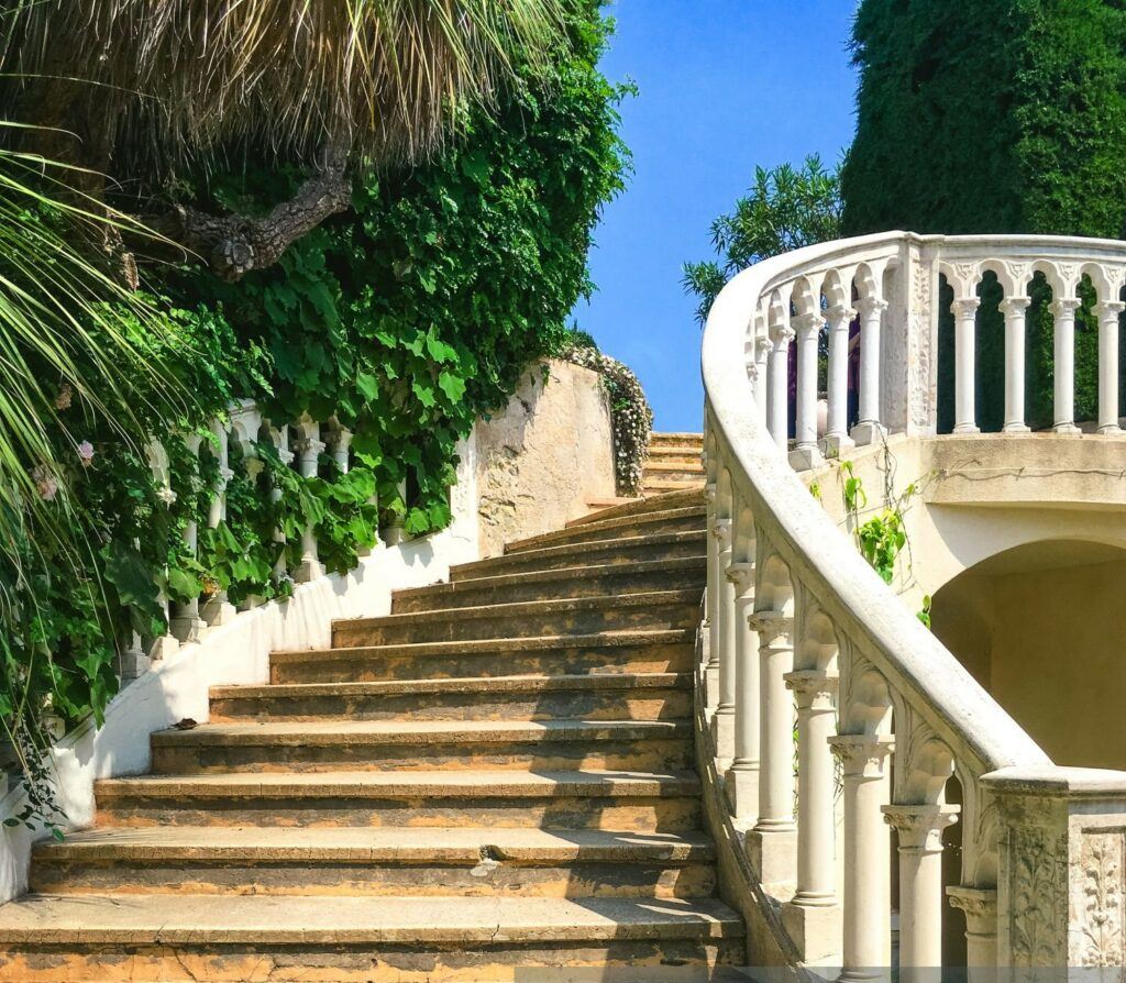 stone balustrade systems, in this photo it shows and older sweeping stone stairway .